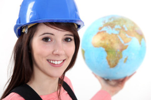 Tradeswoman holding a globe