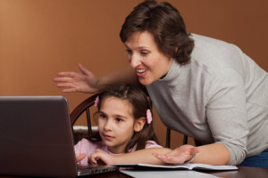 Mother and Daughter Working on Homework